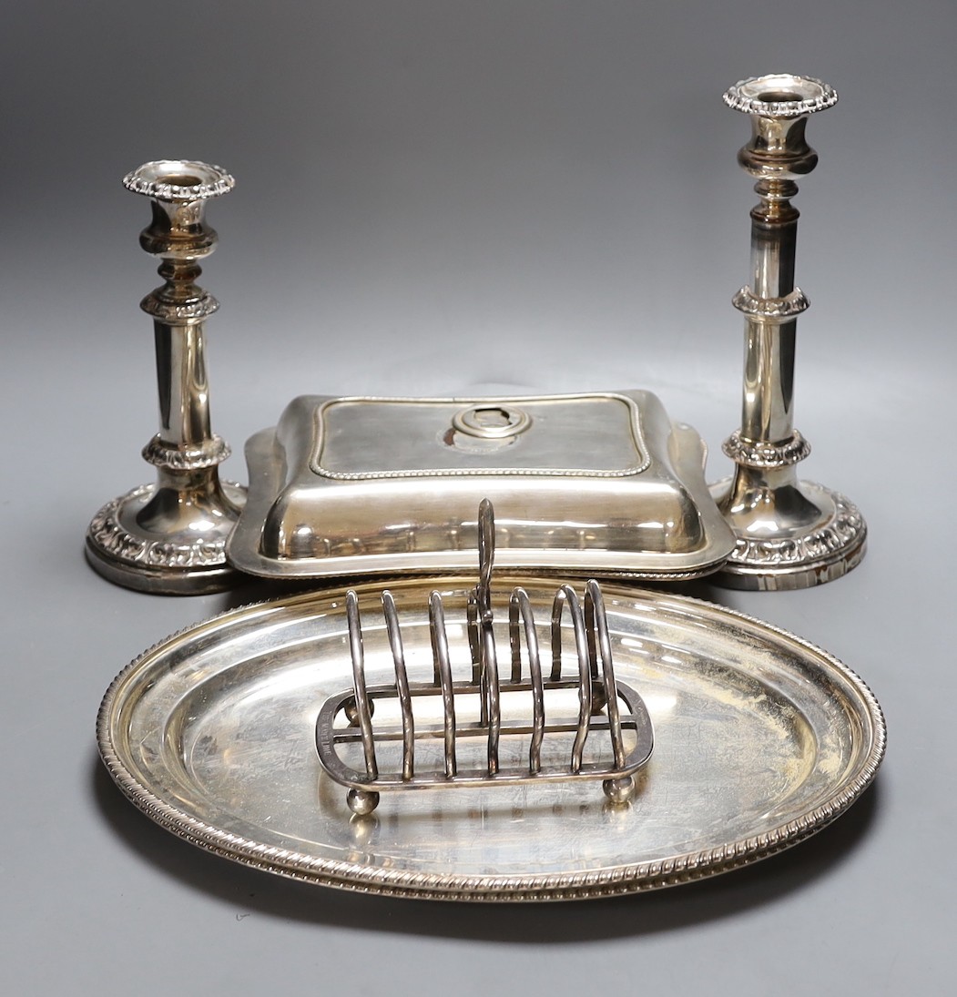 Plated wares to include a pair of telescopic candlesticks, toast rack and entree dishes